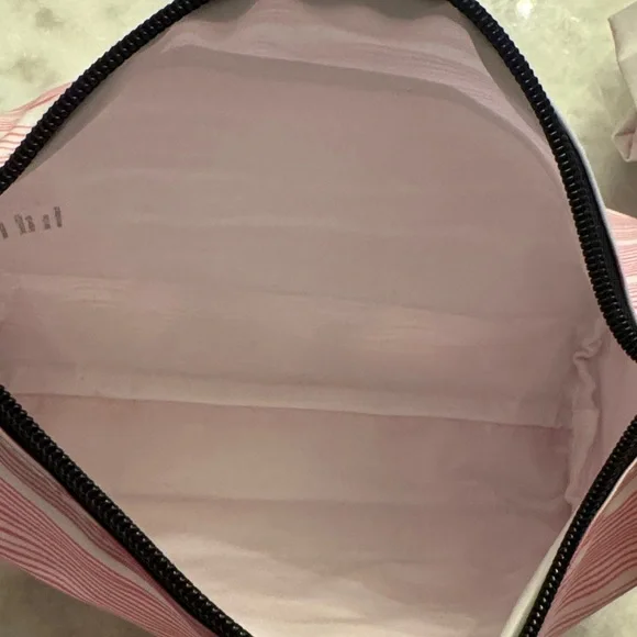 SCOUT Packin' Heat Makeup Bag featuring a pink and white wavy stripe pattern. - Picture 13 of 15